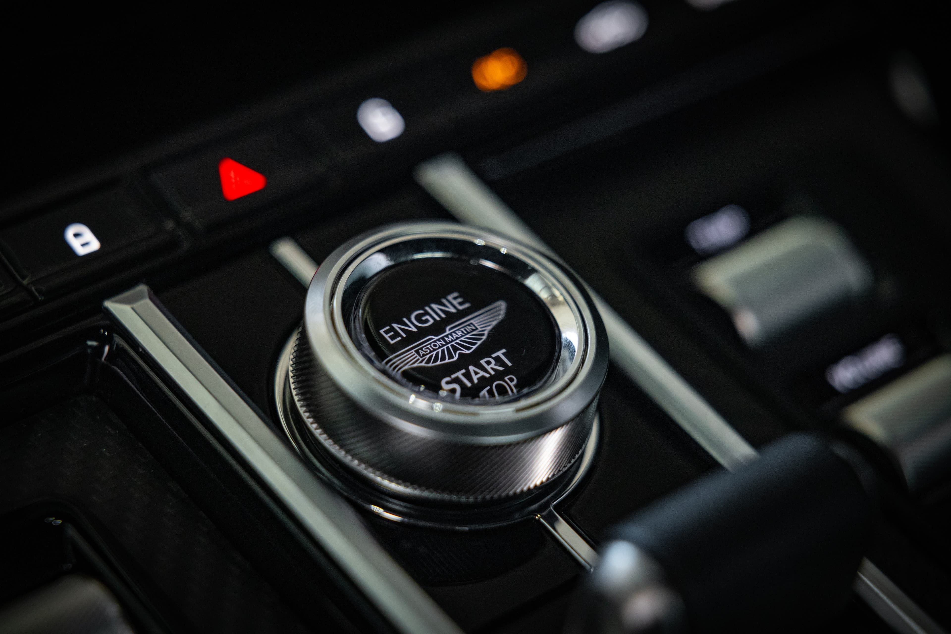 Aston Martin engine start button detail