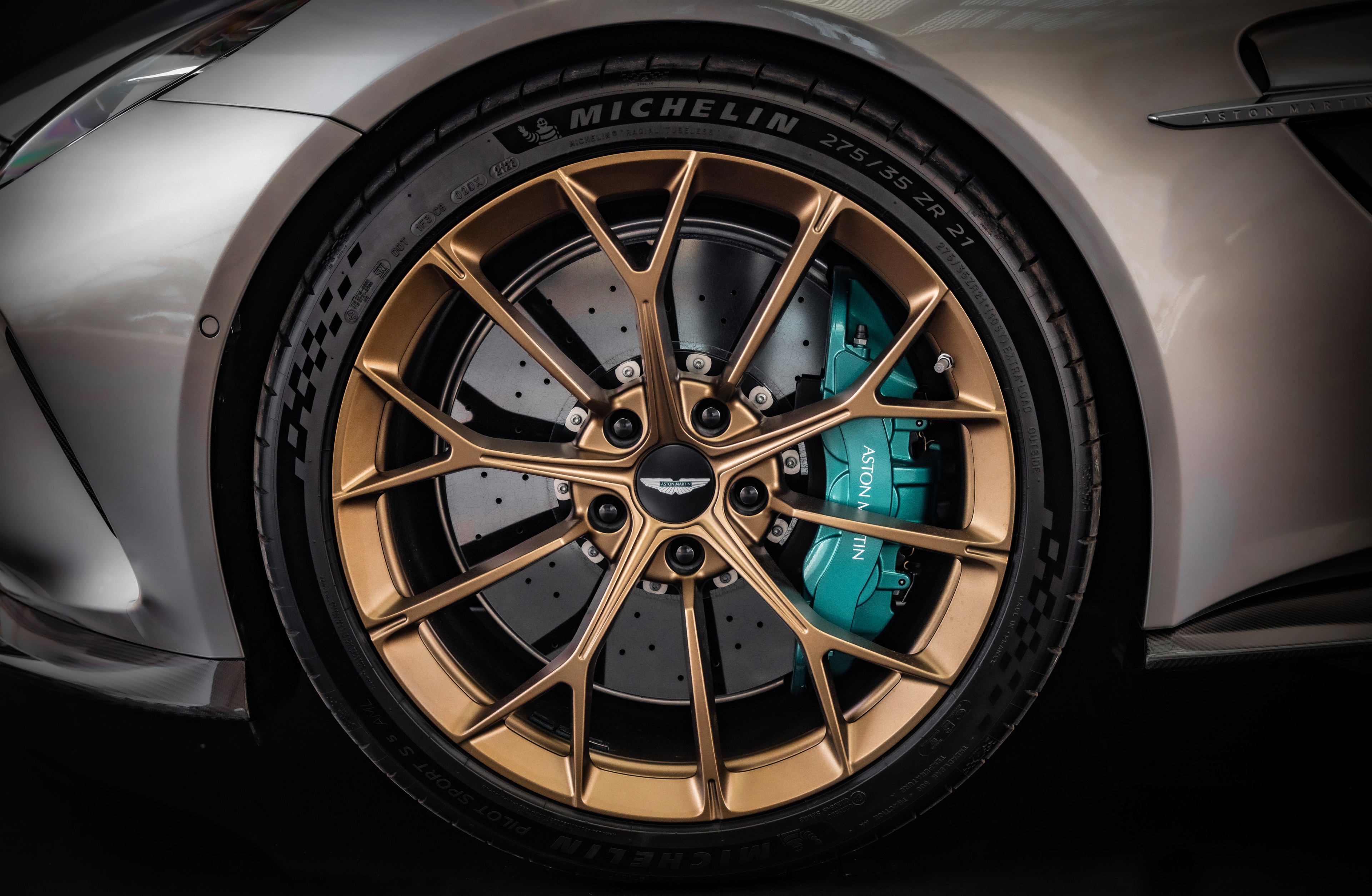 Aston Martin bronze wheel with green brake caliper