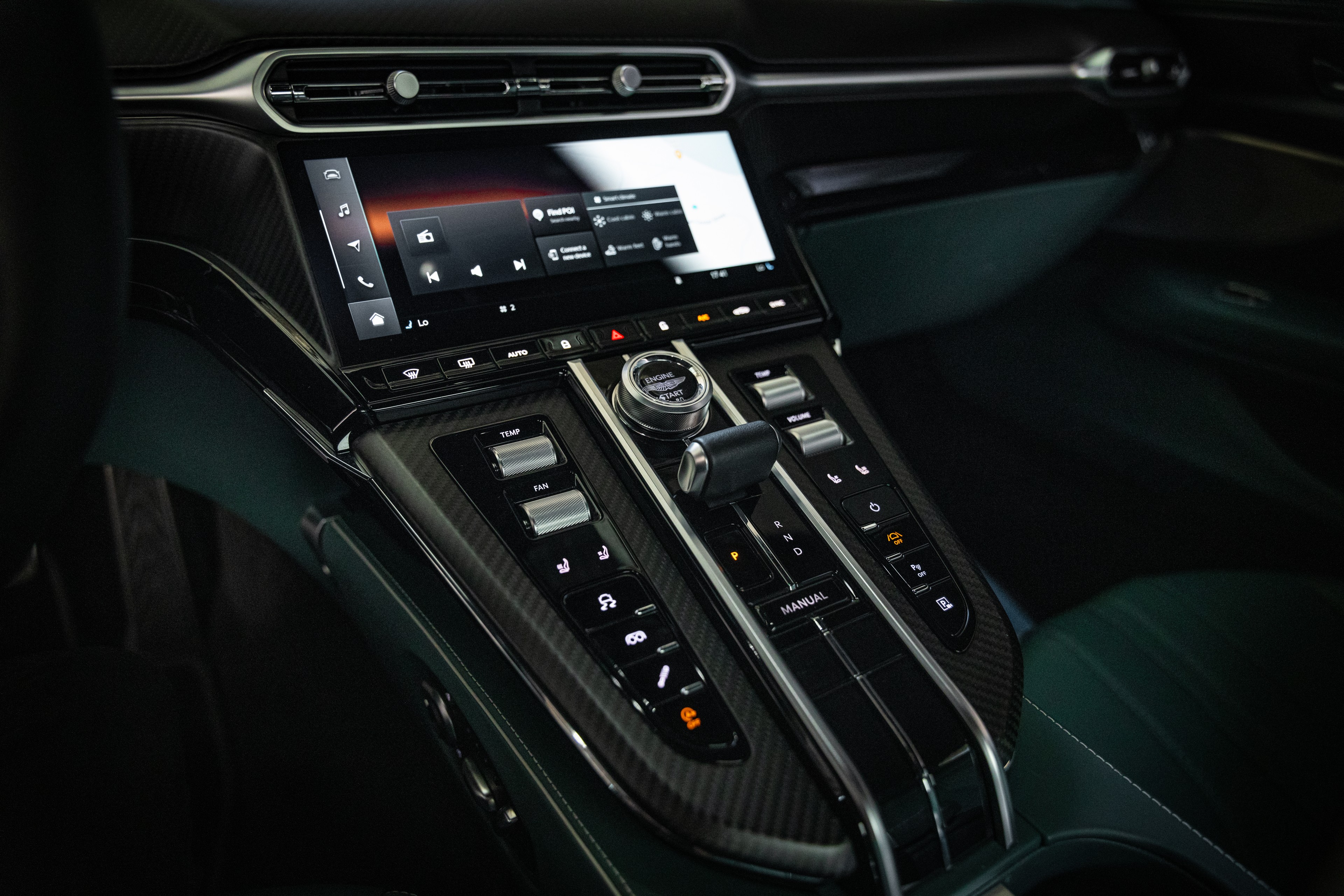 Aston Martin center console and carbon-fibre detail