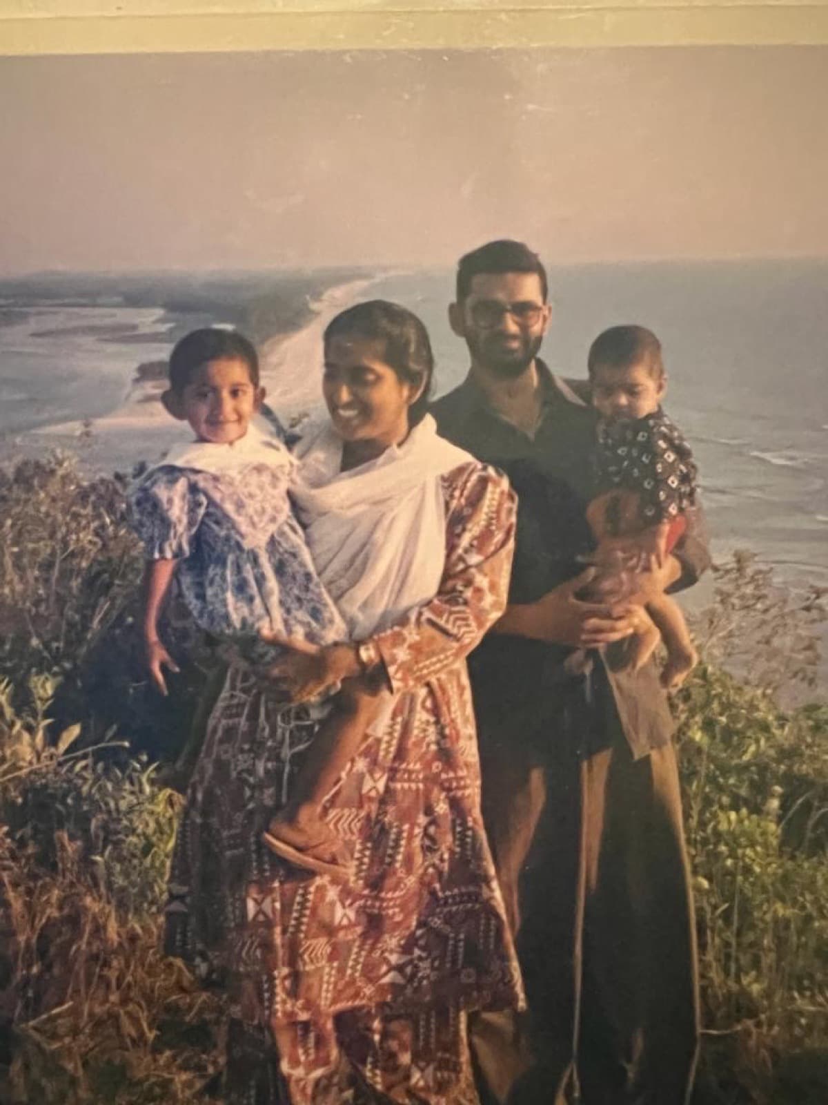 David as a young child with his family on the coast