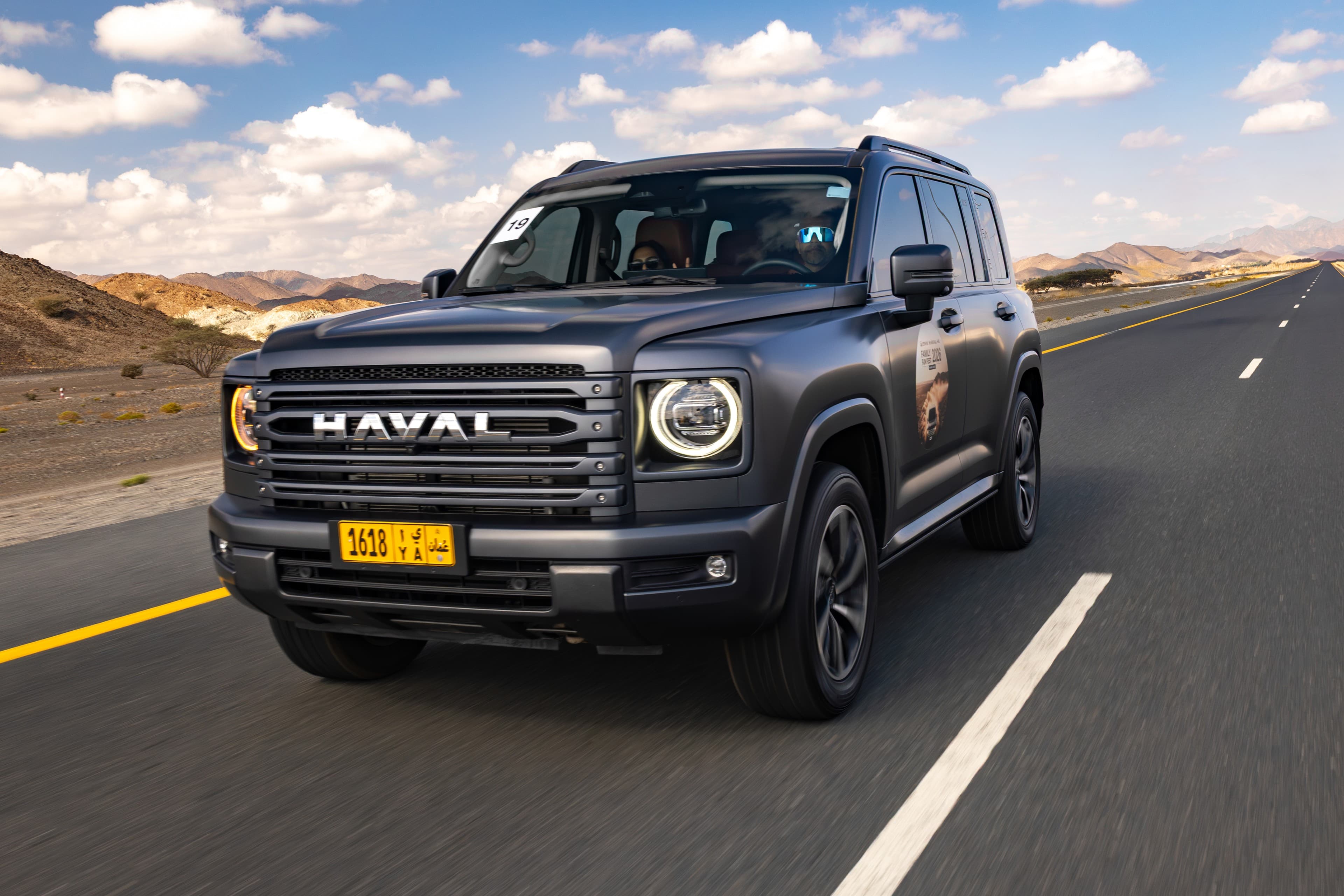 SUV rolling on mountain road